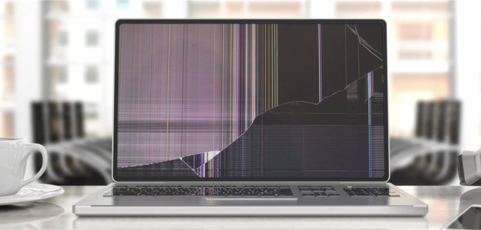 fix laptop with broken screen - broken laptop in office